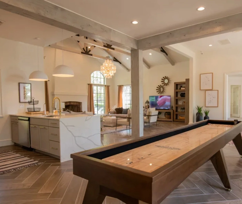 business center with kitchen and shuffleboard