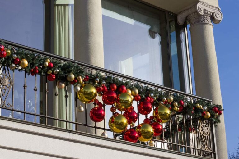 Apartment Balcony and Patio Christmas Decorating Ideas Alt Text: A balcony with classical columns decorated with gold and red Christmas ornaments attached to pine branches. (Source) Winter is here, so it’s time to bring out the holiday cheer! Decorating an apartment balcony for Christmas is a wonderful way to get started. We know it can be tricky to find the right way to spice up your apartment for the season, but your balcony can be an excellent place to show off your decorating skills. There are plenty of creative ways to make your outdoor space festive and inviting, and today, we’ll go over small apartment Christmas decor ideas that brighten your home and make your space feel cozy, cheerful, and full of holiday spirit. [H2] Apartment Balcony Christmas Decorating Ideas With Lighting Lighting can be a great way to keep your apartment festive during the holidays or any day of the year. It’s practical, affordable, and easily adjustable, but make sure you get the perfect lights for your home. While all LEDs will save you money in efficiency, not all are made the same. If your balcony or patio is exposed to the elements, either because it’s uncovered or you experience frequent severe weather, opt for lights designed to handle outdoor conditions. Rope lights are often built into surgical tubing, and while they may not be as easy to bend around corners, they’re highly resistant to bumps, scratches, and moisture. Another great option is LED lamps. Like any lamp, they’re enclosed to keep bad weather out and can create a warm, cozy glow. For a classic holiday look, try flame-imitating bulbs, and to get the most out of your decorative lighting, plug your setup into an outlet timer so you can set exactly when your lights turn on or off. [H2] Year-Round Christmas Decor for Your Apartment Balcony Alt Text: A wreath made of dried plants and goldenrain tree seeds, wrapped in evergreen and wheat, sits on a deck railing. (Source) Some of the best Christmas decor for apartment balconies are the kind you can keep up all year. While certain decorations like inflatable Santas and stockings may need to come down after the New Year, there are plenty of festive touches that can stay outdoors long after the holidays. Wreaths are a great example, and it’s easy to refresh them with each season. You can swap out ribbons or add new ornaments for a quick, inexpensive update. Plants are another excellent way to stay festive year-round. As we mentioned in our Apartment-Friendly Christmas Decorating Ideas guide , potted Christmas trees can look great both indoors and on your balcony. With proper care, your tree can last through the year and be ready to decorate again when the holidays return. [H2] Life-Size Apartment Balcony Christmas Decorations Wreaths and garlands are one thing—but have you ever created your own Santa scene? Many families have enjoyed creating these friendly Santa mock-ups for generations. Whether it’s posed on a bench or waving from the window, they’re easy to make and fun for the whole family. Grab some old pillows and stuff them into an oversized red jacket. A foam head topped with a stocking cap and a white beard can complete the look, though feel free to get creative if you have different supplies on hand. Depending on how you style it, your Santa can look elegant, whimsical, or delightfully funny. Either way, the photos and memories will bring a smile to every guest who stops by. [H2] Keep Your Balcony or Patio Decorations Accessible We love seeing all the creative decorations our residents across our communities put up during the holidays, but it’s always important to make sure your outdoor spaces are ready to withstand winter weather without becoming a hazard. Snow, freezing rain, or even high humidity can cause your patio to ice over. Even a thin layer of ice can become slippery, especially on concrete, where it’s difficult to see. Before freezing temperatures hit, take an extra step to keep your space comfortable and accessible. Sprinkle anti-icing salt or use other approved de-icing products on your balcony or patio before setting up your decorations. This strategy works well for walkways, steps, pavers, and any ice-prone surfaces around your home. A quick pre-treatment helps keep the area ready for family gatherings, guests, and cozy evenings spent admiring your handiwork. [H2] Get Comfortable in Your New Home From Case & Associates Alt Text: A comfortable patio with wicker furniture, a string of light bulbs, and cups of hot chocolate with marshmallows on top. (Source) Find your next home in an apartment from Case & Associates. Our communities across the Midwest and South are built with convenience and comfort in mind, with upscale amenities designed to make every season enjoyable. From personal fireplaces and private patios to beautiful poolside views, there’s always a cozy spot to celebrate the holidays with loved ones. Browse our available apartments at a Case & Associates community near you, and see how easy it can be to call one of our communities home. We’d love to show you around and help you find the perfect place to start your next chapter. Contact Case & Associates today to schedule a tour.